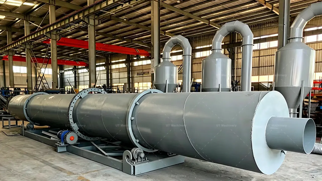 Primer plano del sistema de rodillos y transmisión por engranajes reforzados en un secadero rotativo UT Machinery